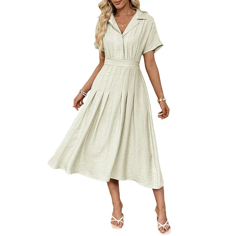 Light green twill shirt dress with lapel, fitted waist and commuter pockets