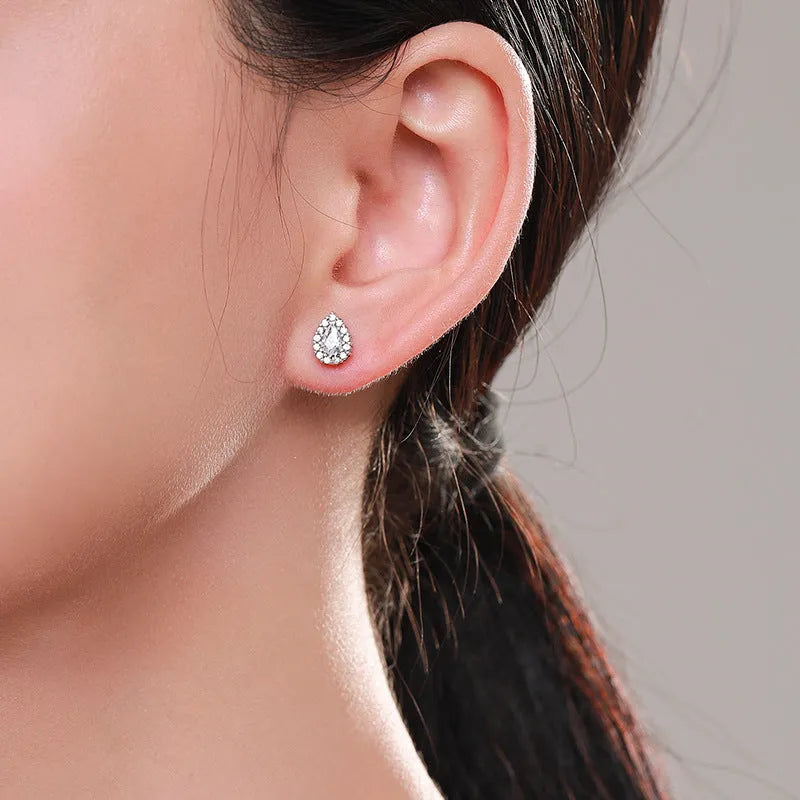 Women's silver drop ear studs with diamond cut treatment in water drop shape