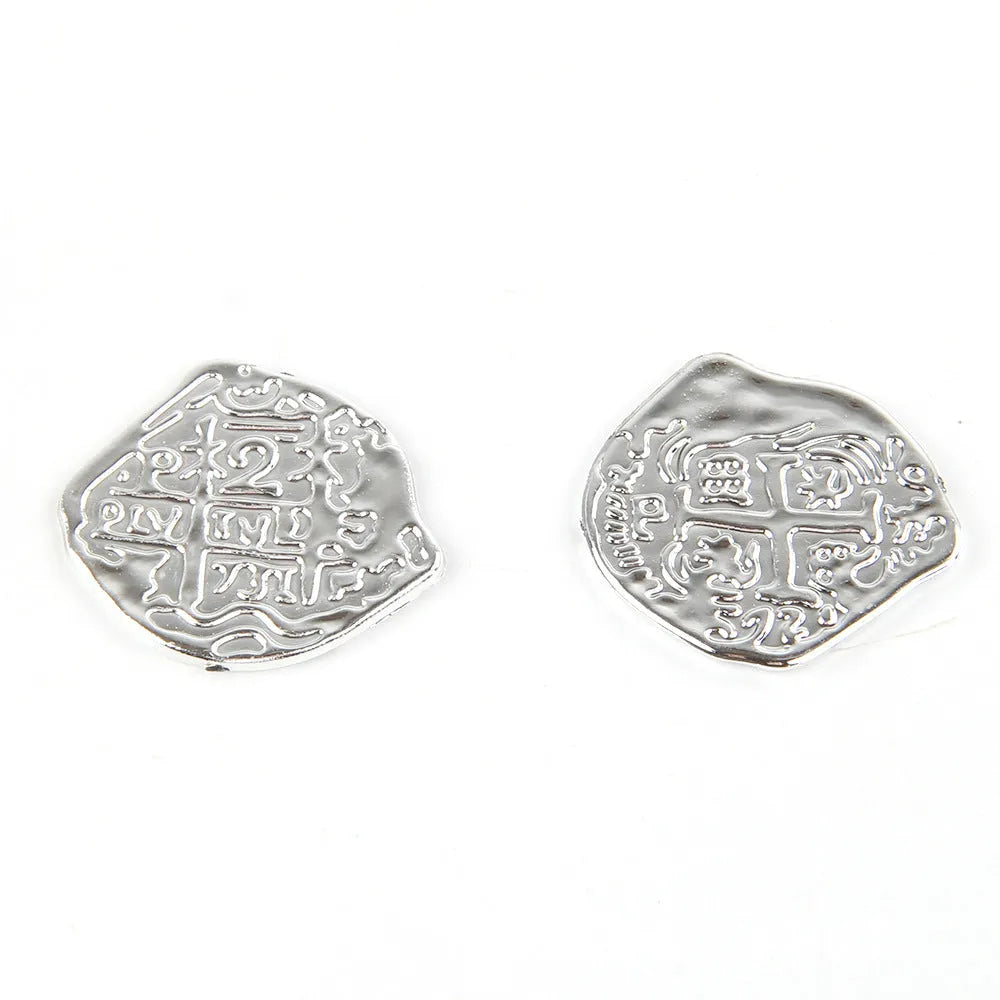Doli set of 100 electroplated plastic Roman coin replicas in gold, silver, and bronze finishes for costumes and props