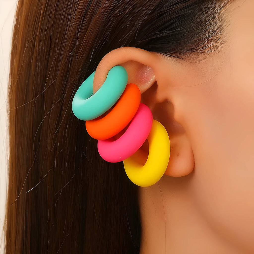 C-shaped geometric clip-on earrings with matte coarse finish in a selection of candy colours