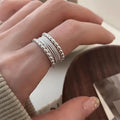 Adjustable copper ring with woven twisted multilayer geometric design for women