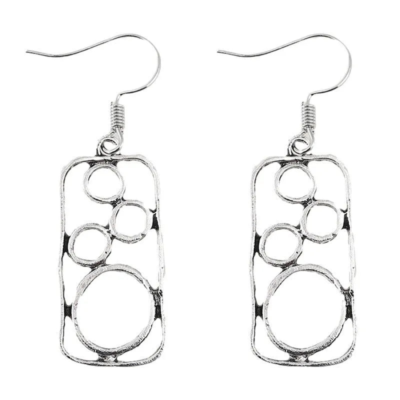 Geometric ring earrings in antique silver colour with irregular square and round shapes