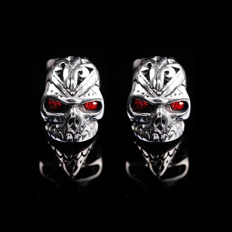 Retro red eye ghost head skull stud earrings with alloy gemstone inlay for women and unisex wear.