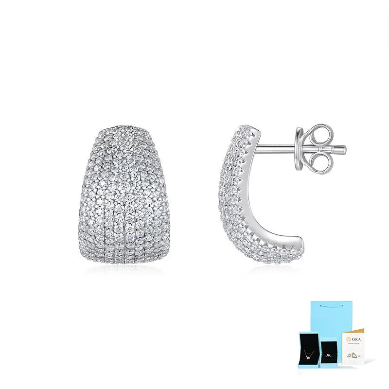 Geometric women's stud earrings in sterling silver with white moissanite stones, presented in a gift box.