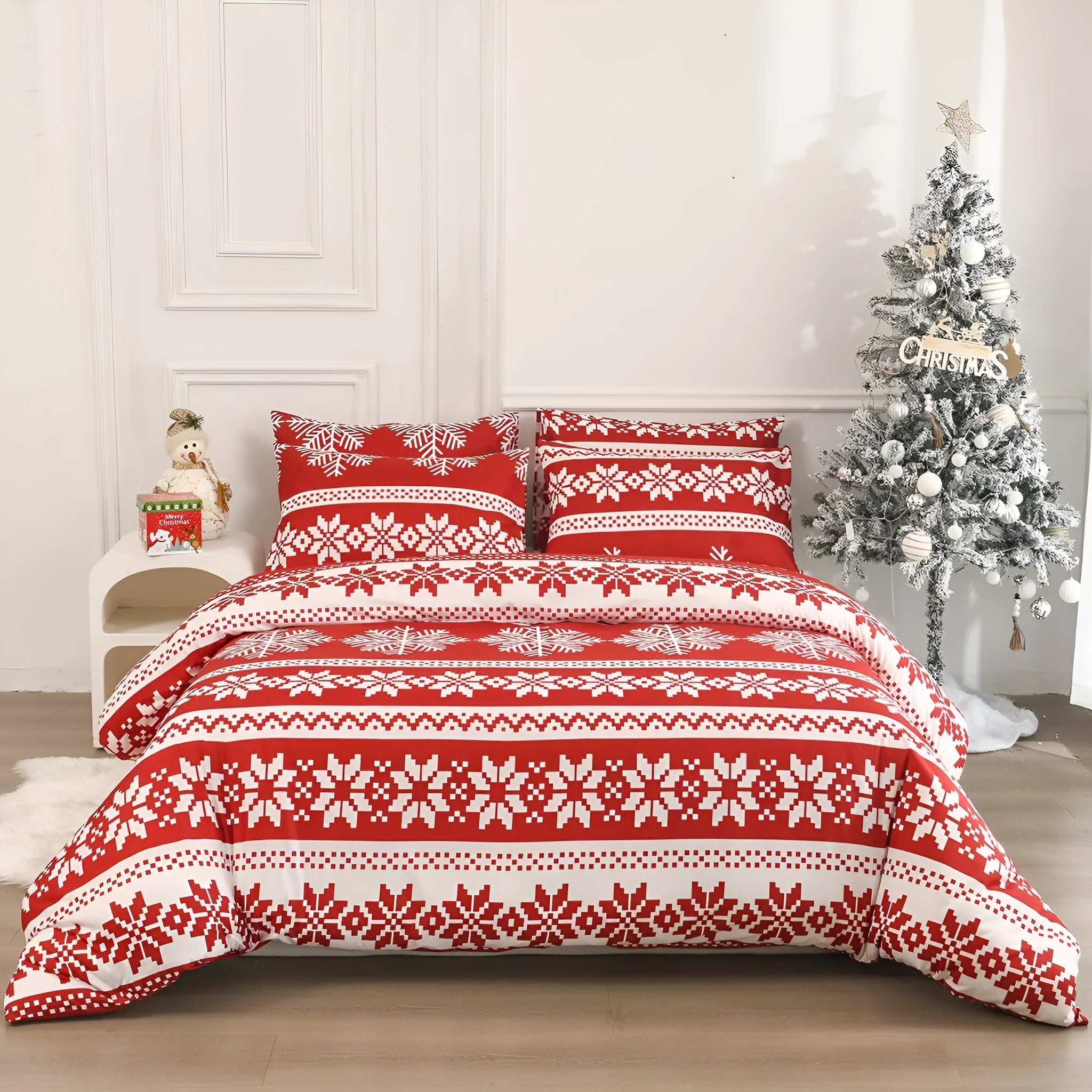 Red Christmas pattern three-piece bedding set with quilt cover and pillowcases on bed