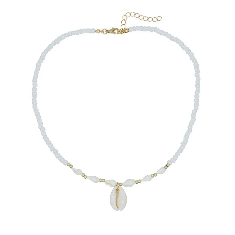 White conch shell necklace for women with a natural mother of pearl pendant on a chain.