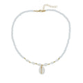 White conch shell necklace for women with a natural mother of pearl pendant on a chain.