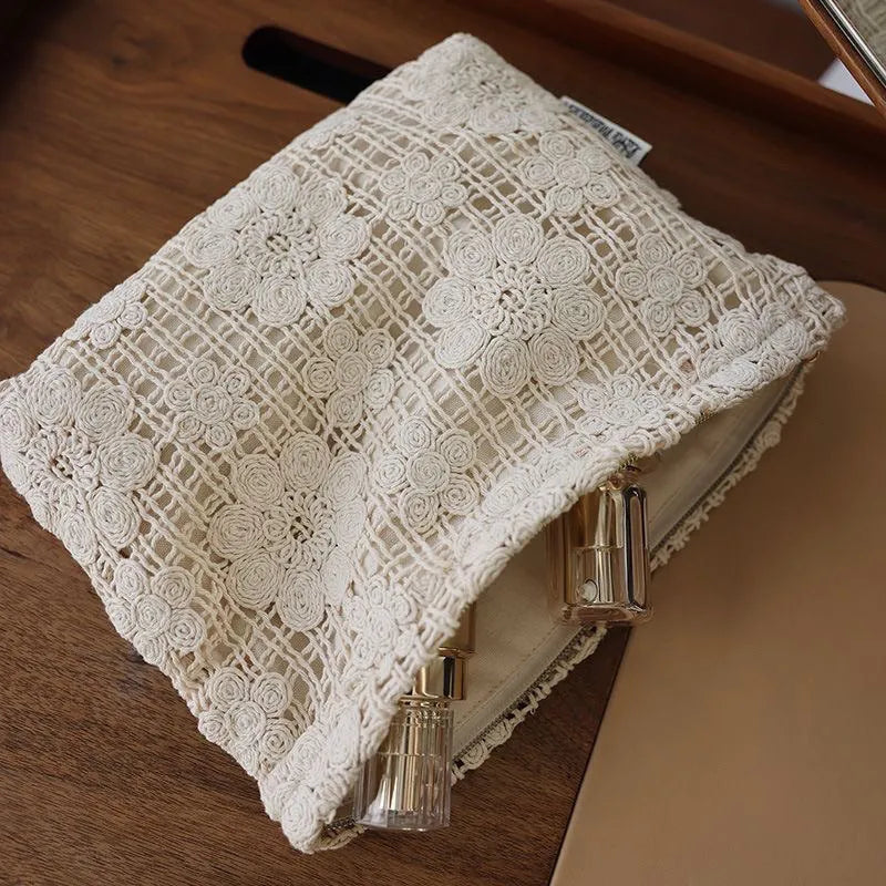 Handmade corducrochet hollow flower cosmetic bag with ethnic embroidery, rope colour variation