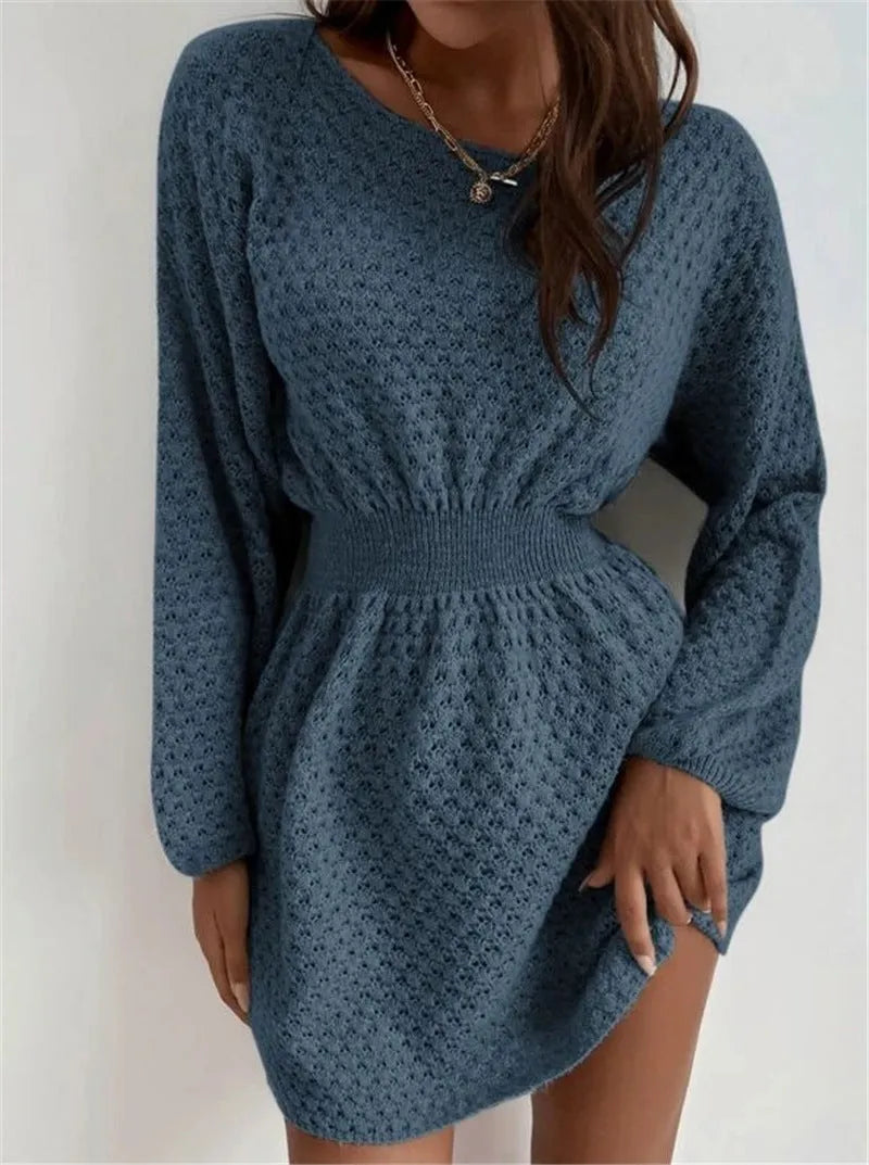 Blue women's knitted dress with hand-crocheted flower embellishments and fitted waist design