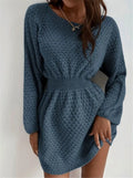 Blue women's knitted dress with hand-crocheted flower embellishments and fitted waist design