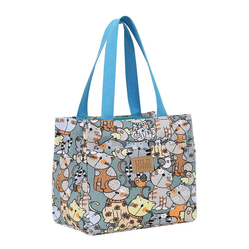 Women's printed canvas handbag with aluminium hardware in horizontal square shape