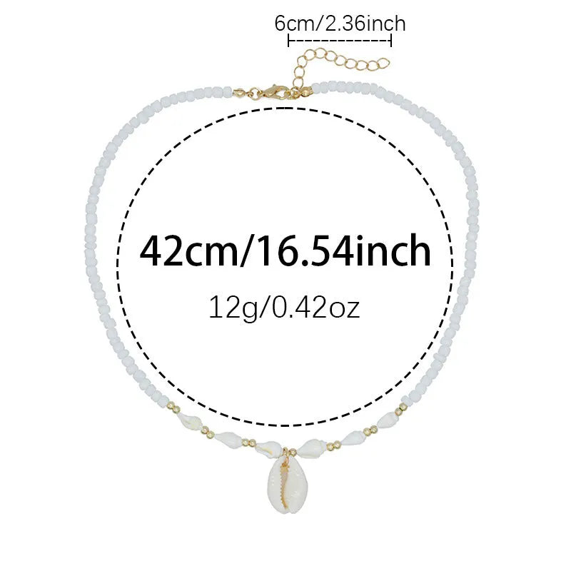 White conch shell necklace for women with a natural mother of pearl pendant on a chain.