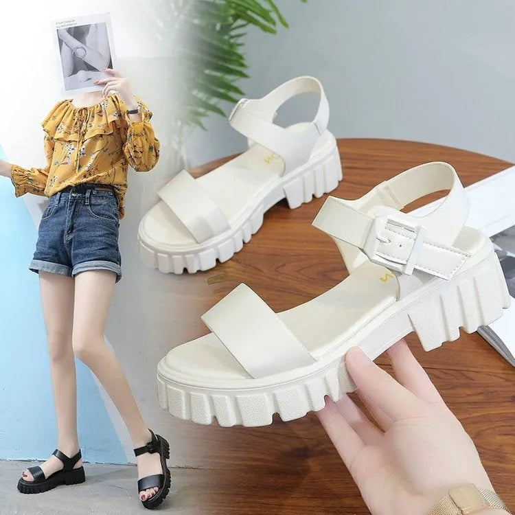 Beige women's peep toe platform sandals with an ankle-strap buckle on a white background.