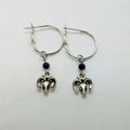 Silver Tibetan antelope round ring earrings for women with Yunnan high altitude inspired design