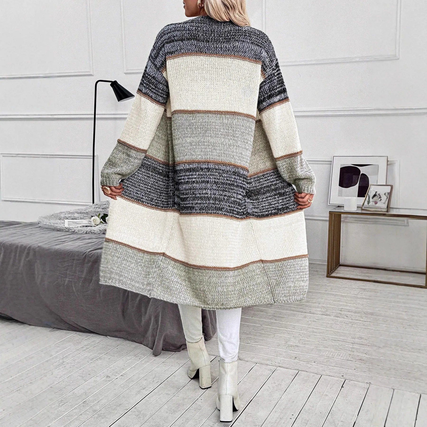 Grey striped loose fit long cardigan for women on a hanger