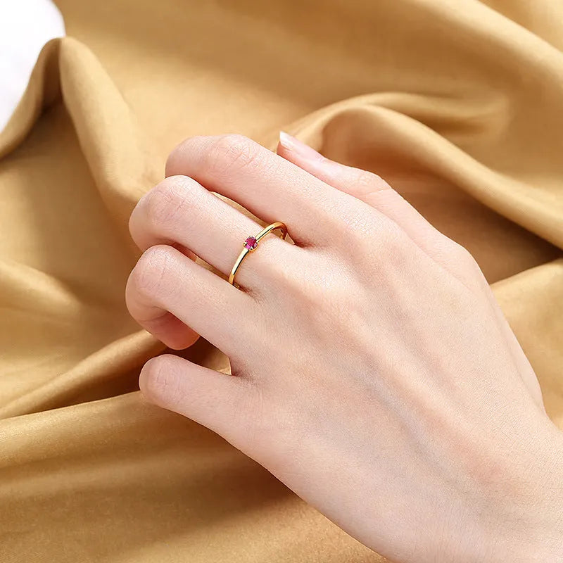 Women's twin-style circle ring with single diamond on copper band showing colour options