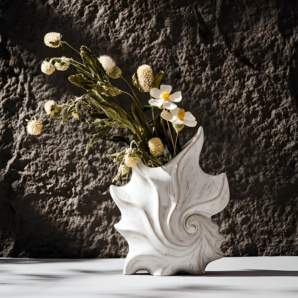 European retro style ceramic vase with a coloured glaze finish on a wooden table.