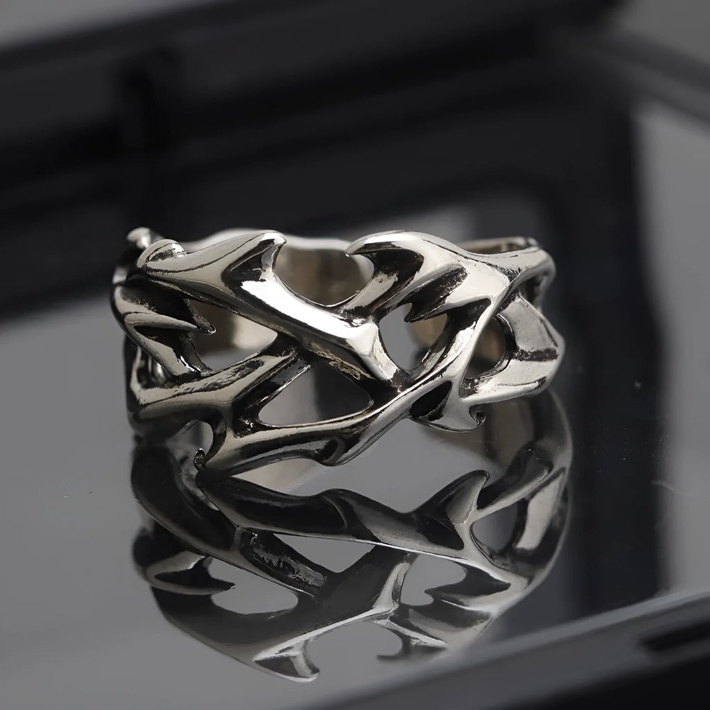 Copper men's ring with geometric thorn flower design and adjustable band in J2150 colour.