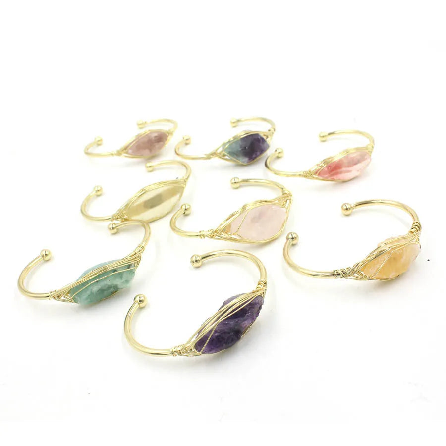 Natural raw gemstone winding crystal bracelet showing simple opening design and amorphous 8mm shape