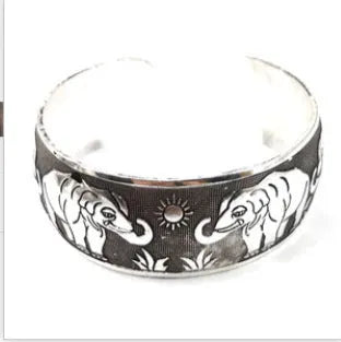 Ethnic Miao silver carved openwork bracelet with Roman shape in turtle colour