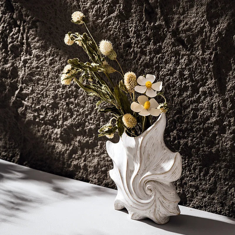 European retro style ceramic vase with a coloured glaze finish on a wooden table.