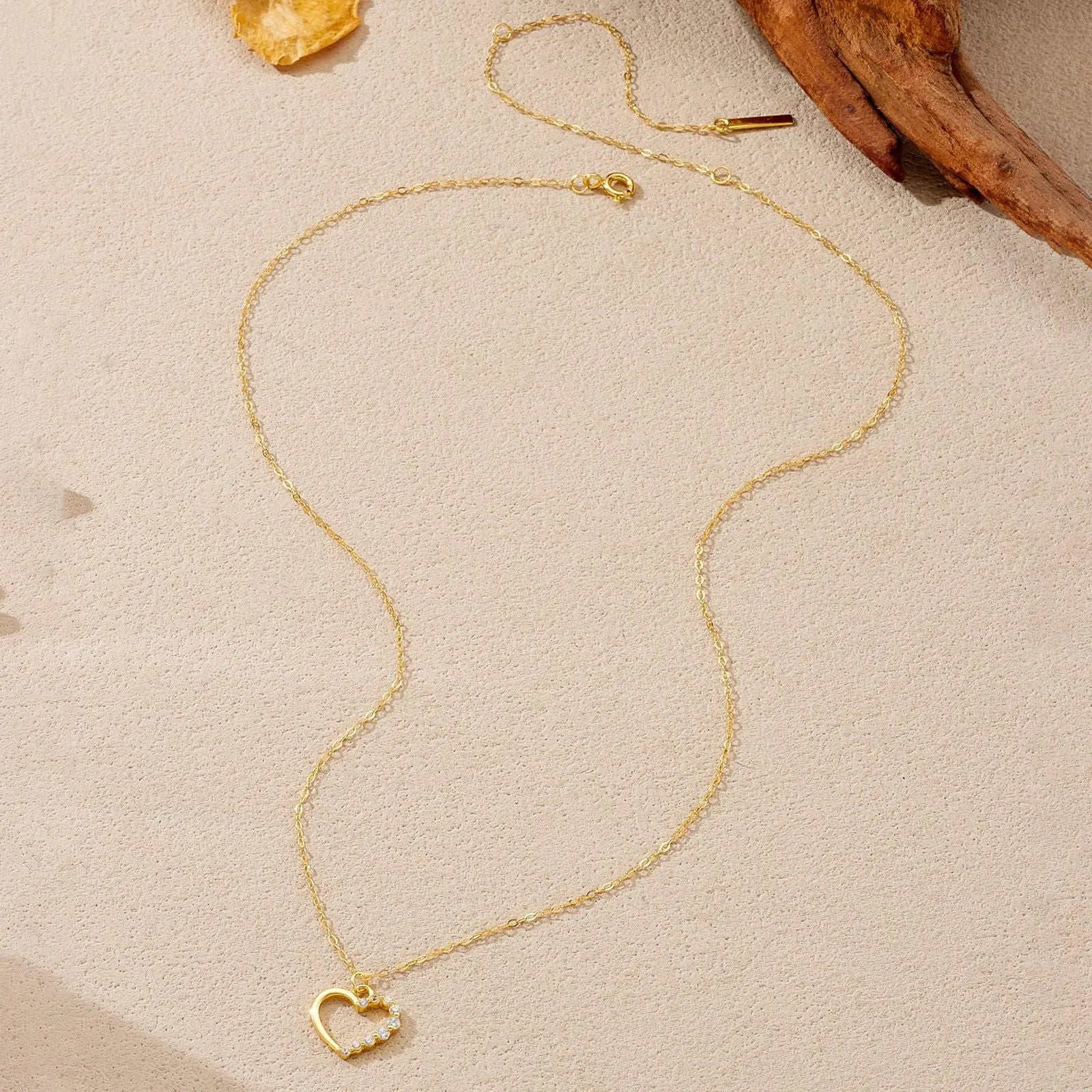 S925 sterling silver hollow heart pendant necklace on a regular chain.