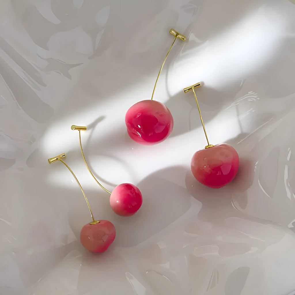 Acrylic peach fruit earrings with gold-tone earwires in small and large size options
