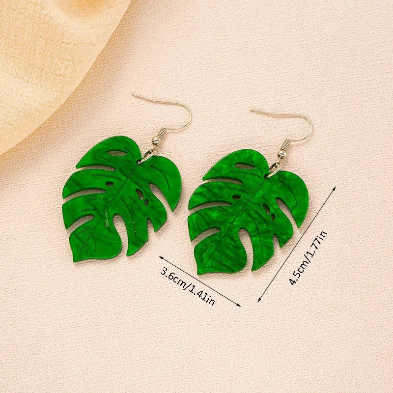 Pair of women's hook earrings with a green and yellow acrylic jackfruit drop decoration on a gold-toned alloy hook.