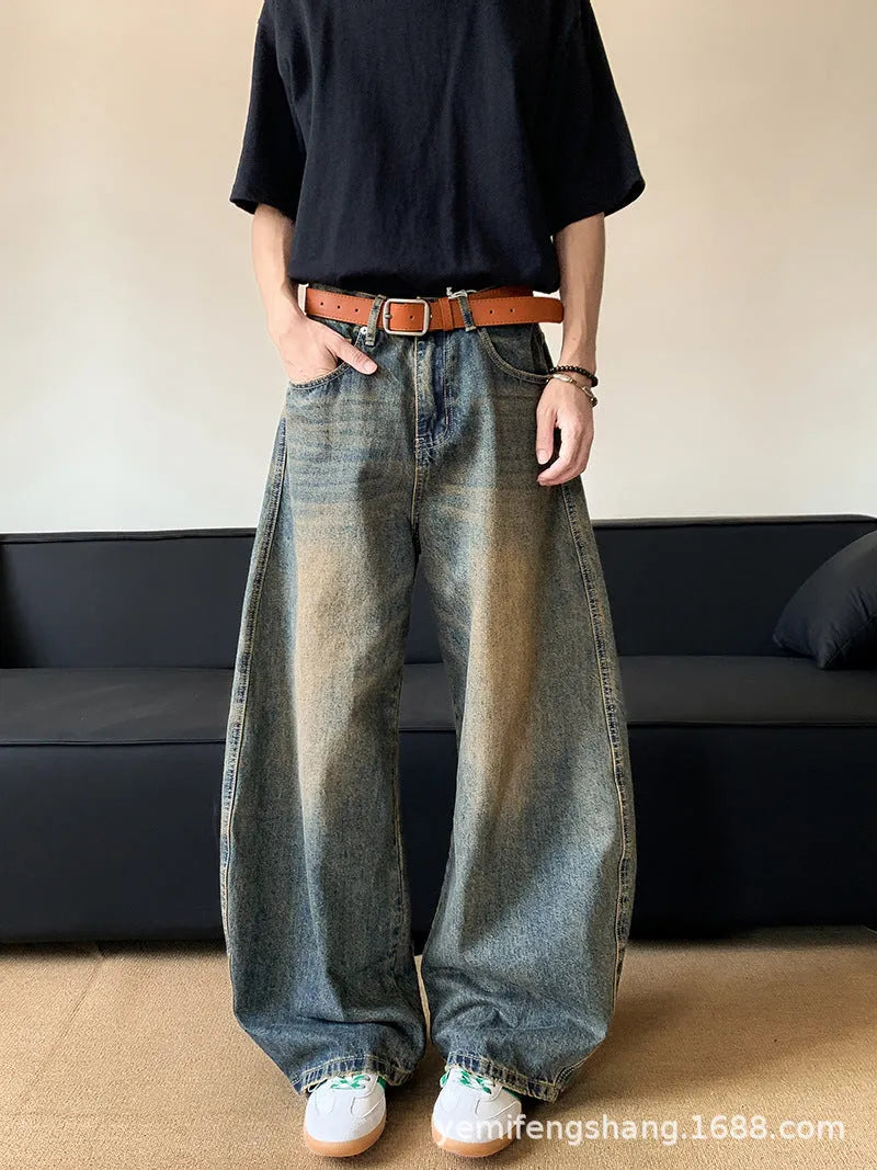 Men's retro blue distressed denim pants with wide leg cut and micro elasticity fabric