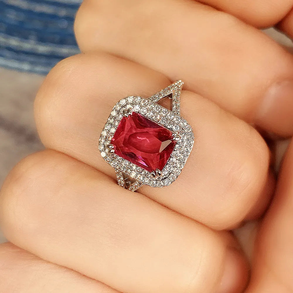 Copper geometric square ring with red rhinestones for women, showing structured design and sparkling accents