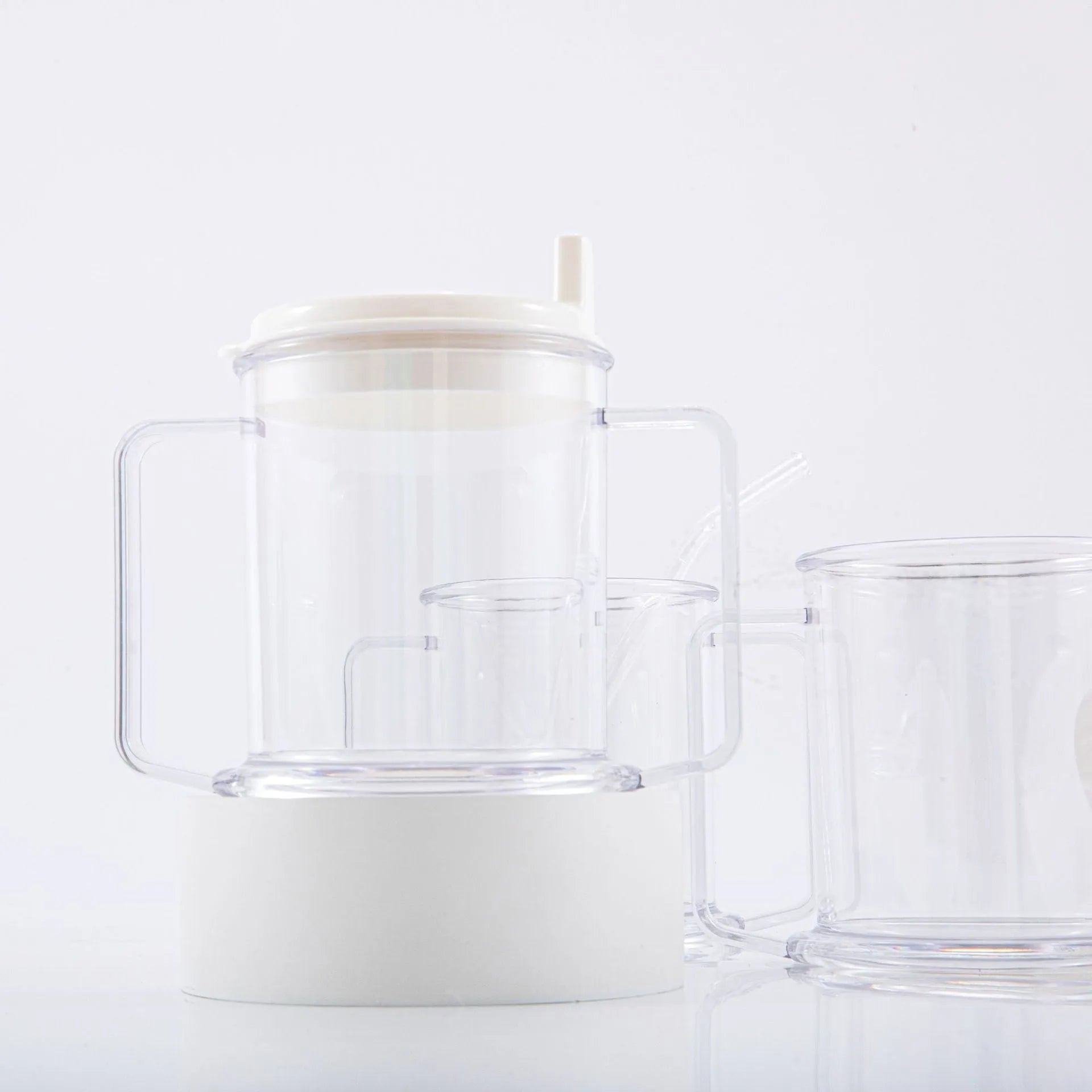 Transparent plastic drinking cup with modern design showing clear liquid visibility