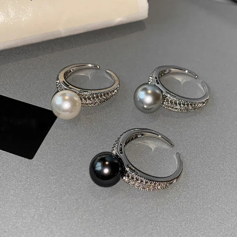 Adjustable copper finger ring with geometric black pearl design, open index construction