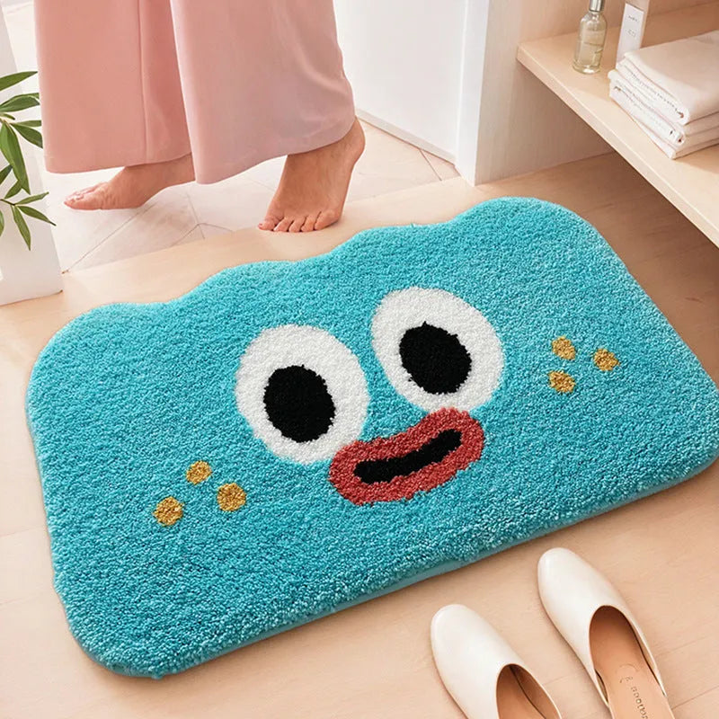 Colourful cartoon anime pattern on a soft, rectangular bathroom mat with a cashmere-like surface.