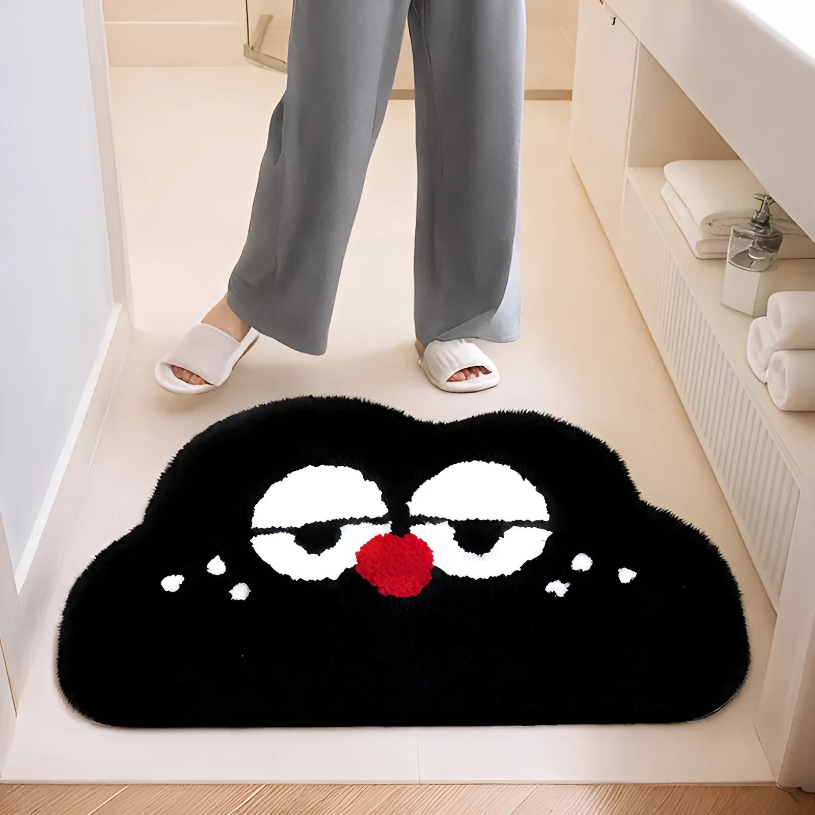 Colourful cartoon anime pattern on a soft, rectangular bathroom mat with a cashmere-like surface.