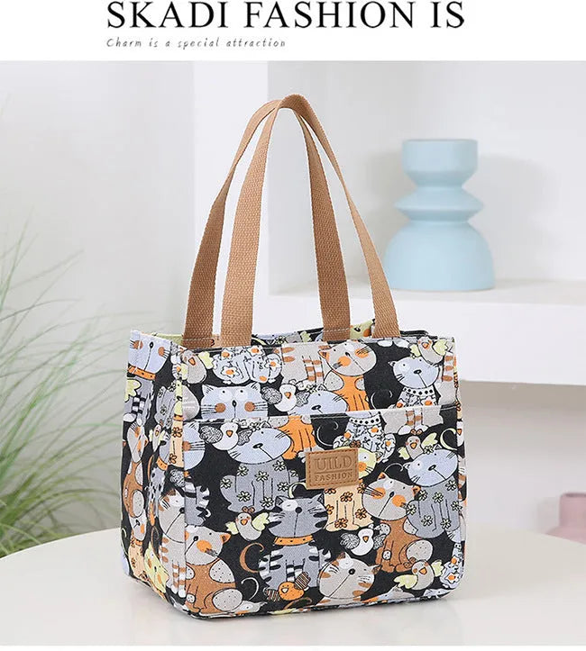 Women's printed canvas handbag with aluminium hardware in horizontal square shape