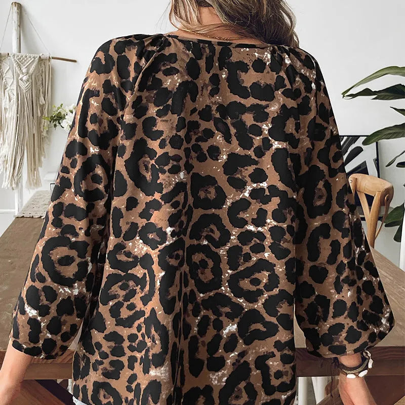 Leopard print women's pullover top with V-neck collar and pleated half sleeves in multicolour pattern