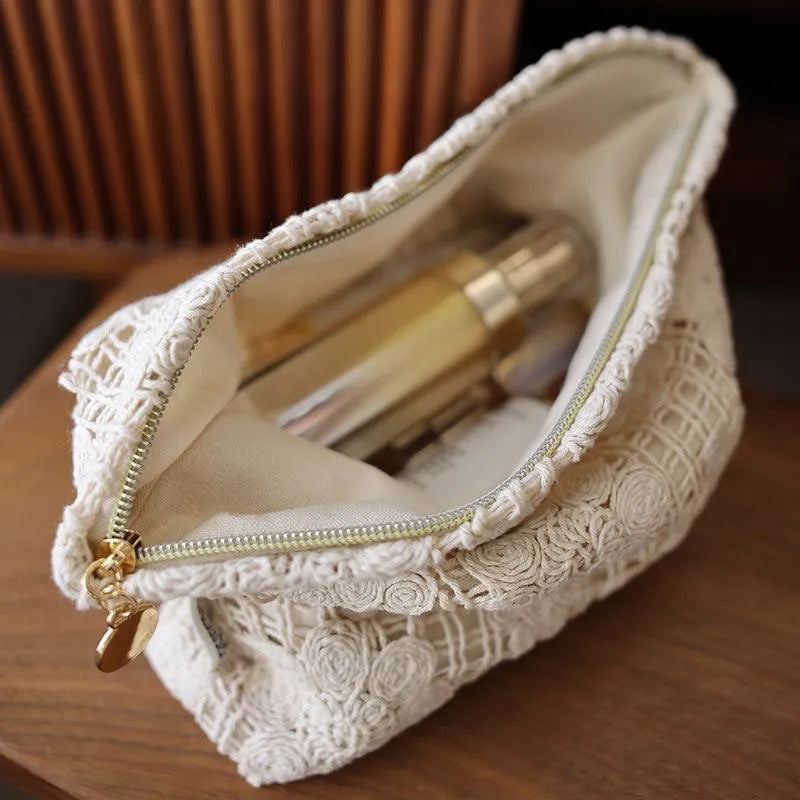 Handmade corducrochet hollow flower cosmetic bag with ethnic embroidery, rope colour variation