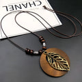 Ethnic wooden leaf necklace on wax line chain, adjustable length