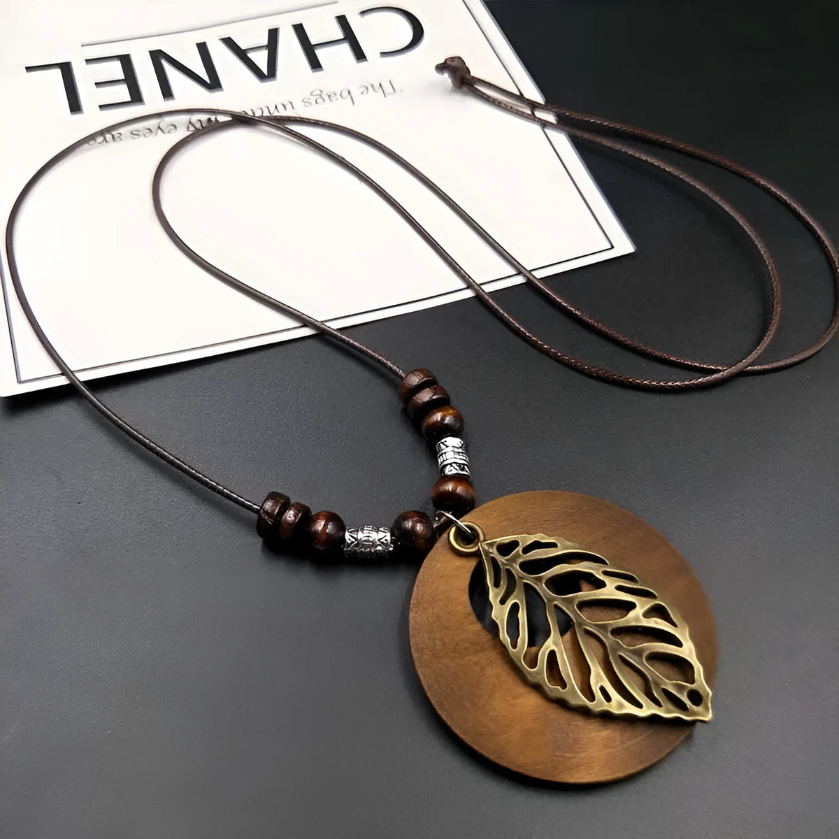 Ethnic wooden leaf necklace on wax line chain, adjustable length