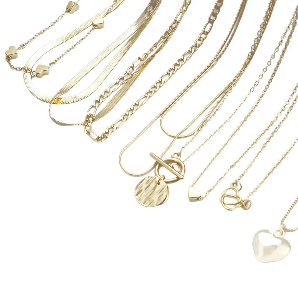 Ten gold-coloured women's necklaces with different alloy pendants on snake bone chains