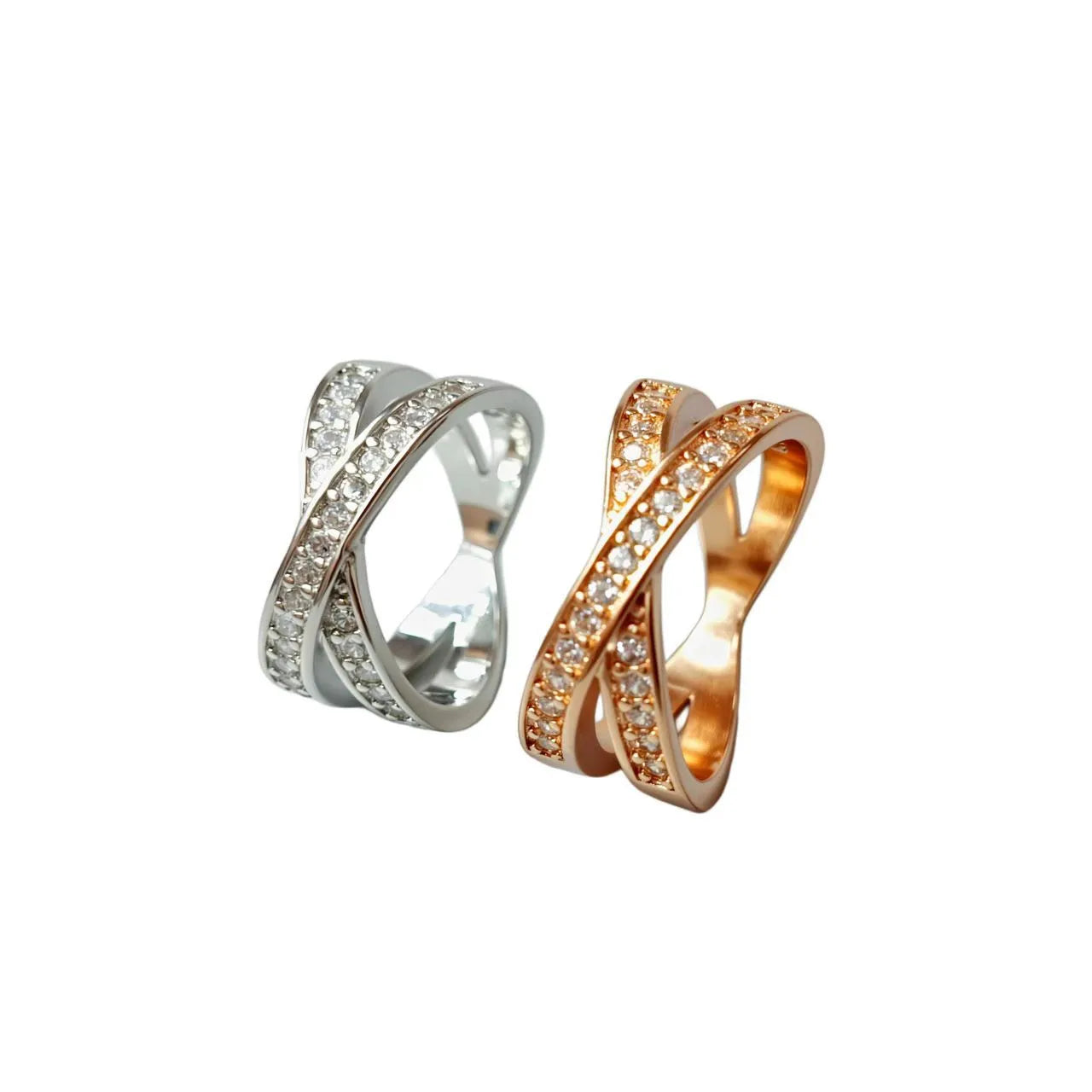 Geometric heart-shaped cross ring with micro-inlaid zircon details on a copper band.