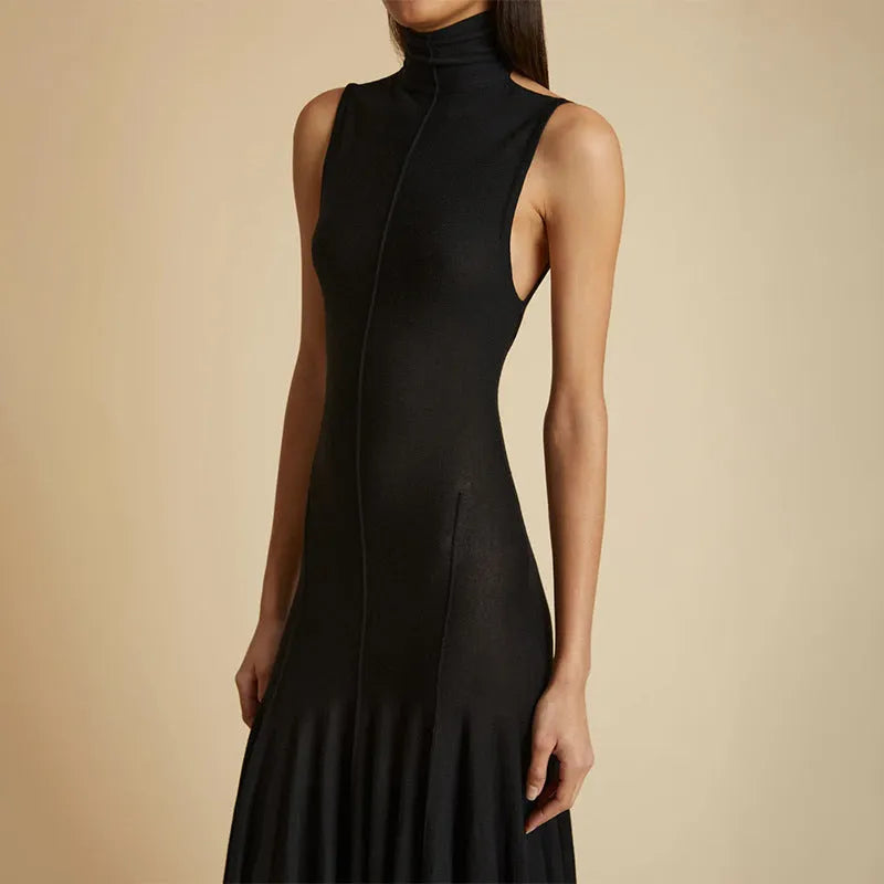 Gray women's slim-fit sleeveless dress with half turtleneck and backless design.