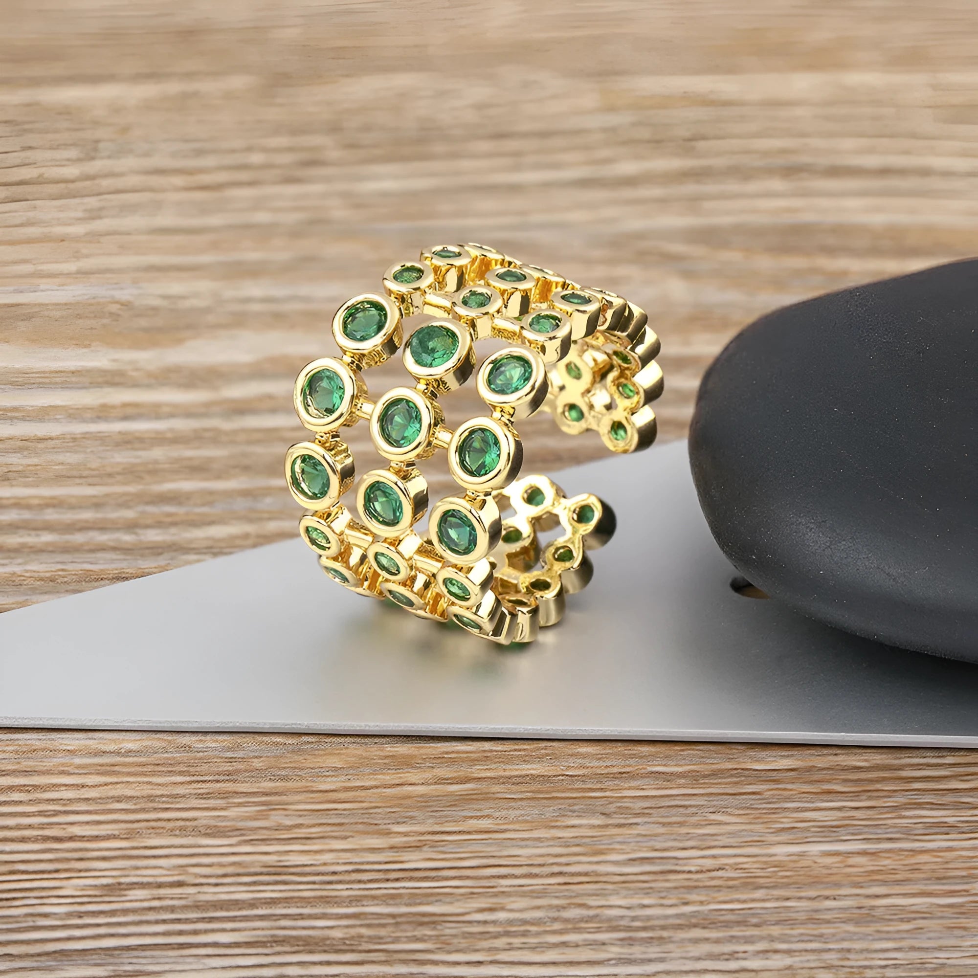 Wide band ring with three layers of green zircon stones and 18K gold plating