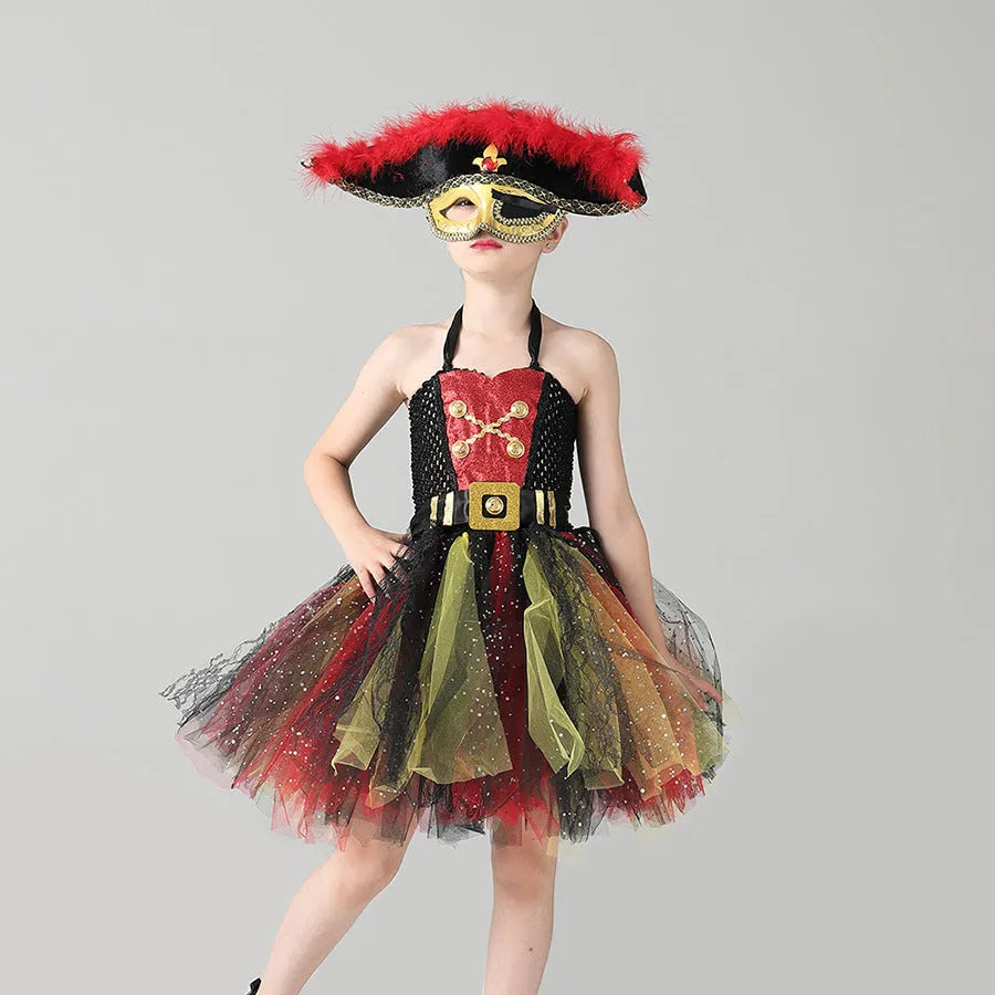 Girl's sleeveless pirate costume dress with sequins, lace, and mesh detailing, shown with an optional hat and eye mask.