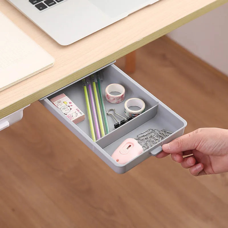 Adhesive under-table plastic storage box with covered lid and internal grid organisation