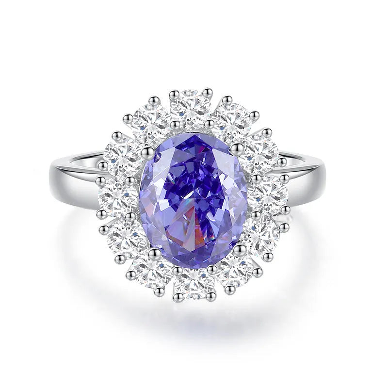 Heart-shaped sterling silver ring with a faceted ice flower cut zircon stone in a Tanzanite colour.