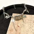 Dark style women's multi-layer clavicle necklace with adjustable hemp flower chain in alloy.