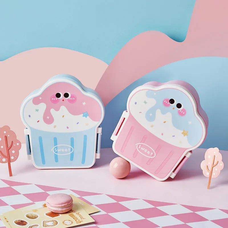 Pink and blue creative ice cream shaped plastic lunch box with spoon and fork on a white background.