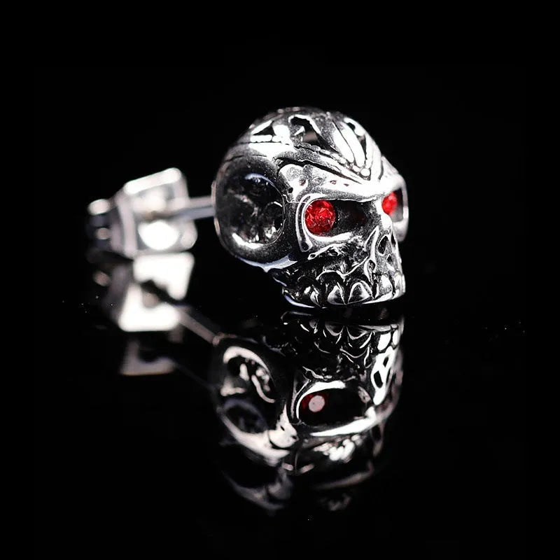 Retro red eye ghost head skull stud earrings with alloy gemstone inlay for women and unisex wear.