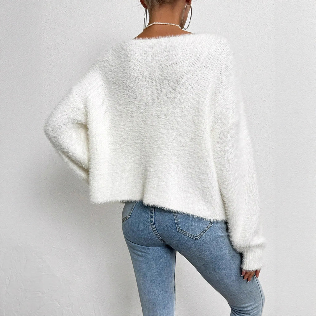 White women's V-neck cardigan with bead knit texture on polyester fabric